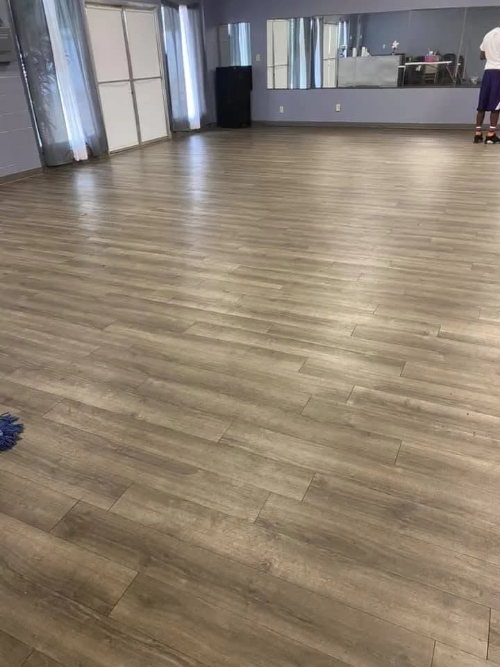 Commercial space with clean wood-look floor